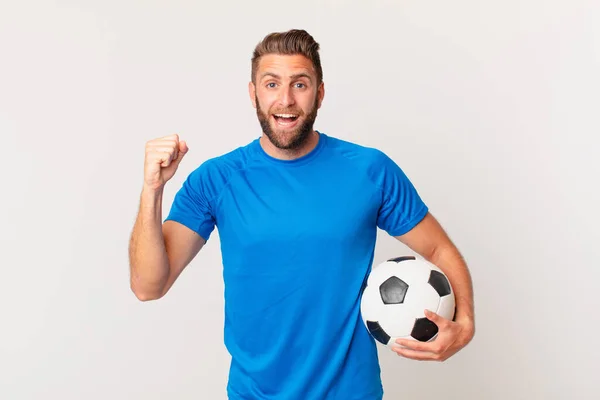 Young Handsome Man Feeling Shocked Laughing Celebrating Success Soccer Concept — Stock Photo, Image