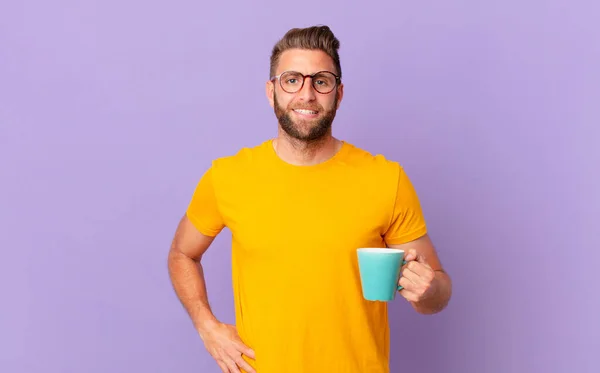 Young Handsome Man Smiling Happily Hand Hip Confident Holding Coffee — Φωτογραφία Αρχείου