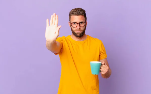 Young Handsome Man Looking Serious Showing Open Palm Making Stop — Φωτογραφία Αρχείου