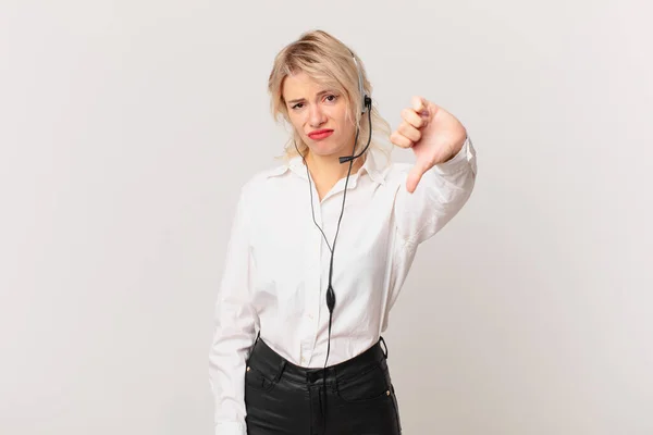 Young Pretty Woman Feeling Cross Showing Thumbs Telemarketing Concept — Foto de Stock