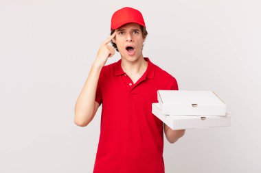 pizza deliver man looking surprised, realizing a new thought, idea or concept
