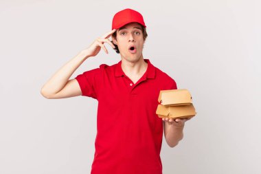 burger deliver man looking happy, astonished and surprised