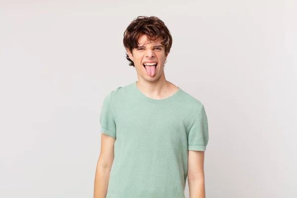 Young Handsome Man Cheerful Rebellious Attitude Joking Sticking Tongue Out — Stock Photo, Image