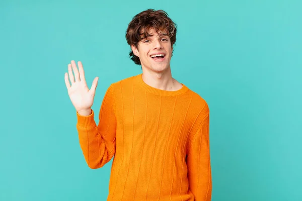 Young Handsome Man Smiling Happily Waving Hand Welcoming Greeting You — Stock Photo, Image