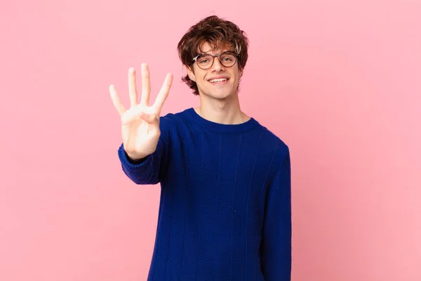 Young Handsome Man Smiling Looking Friendly Showing Number Four — Stock Photo, Image