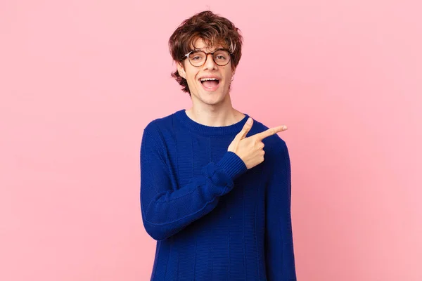 Young Handsome Man Looking Excited Surprised Pointing Side — Stock Photo, Image