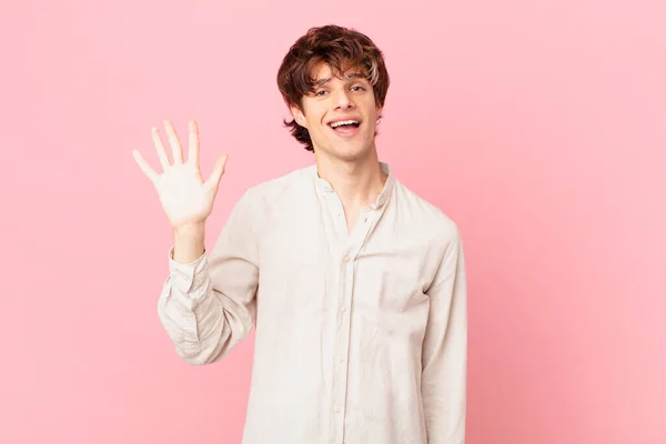 Young Handsome Man Smiling Happily Waving Hand Welcoming Greeting You — Stock Photo, Image