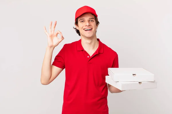 Pizza Deliver Man Feeling Happy Showing Approval Okay Gesture — Zdjęcie stockowe