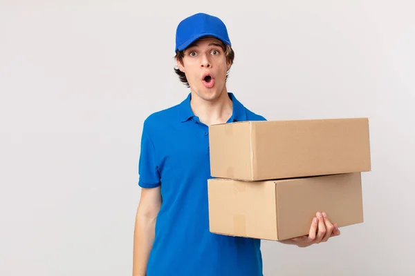 Package Deliver Man Looking Very Shocked Surprised — Stock Photo, Image