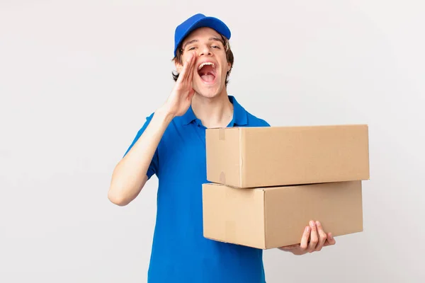 Package Deliver Man Feeling Happy Giving Big Shout Hands Next — стоковое фото