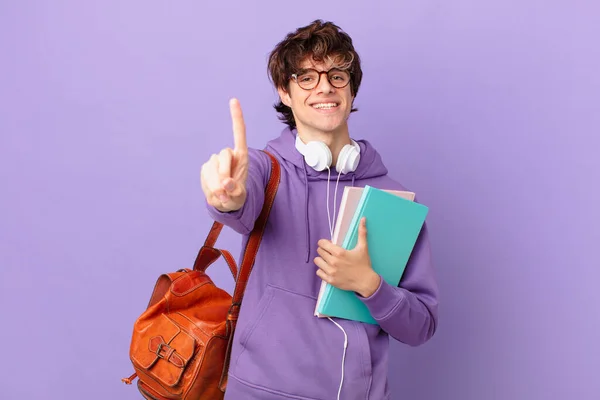 Young Student Man Smiling Proudly Confidently Making Number One — Foto Stock