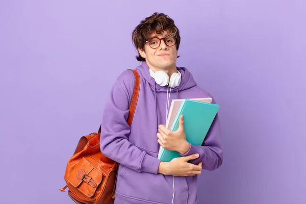 Young Student Man Shrugging Feeling Confused Uncertain — Stockfoto
