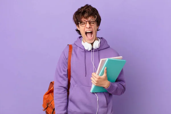 Young Student Man Shouting Aggressively Looking Very Angry — Zdjęcie stockowe