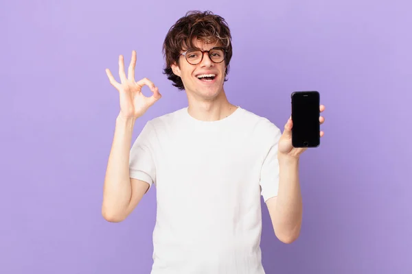 Young Man Feeling Happy Showing Approval Okay Gesture Holding Cell — Photo