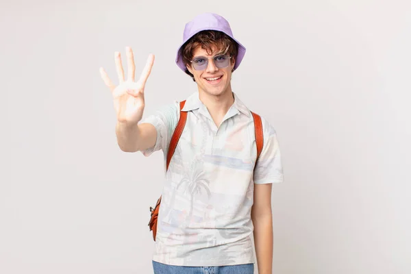 Young Traveller Tourist Man Smiling Looking Friendly Showing Number Four — Stock Photo, Image