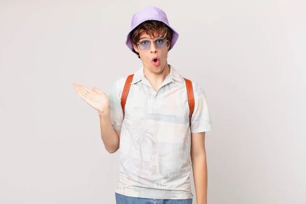 Young Traveller Tourist Man Looking Surprised Shocked Jaw Dropped Holding — Stock Photo, Image