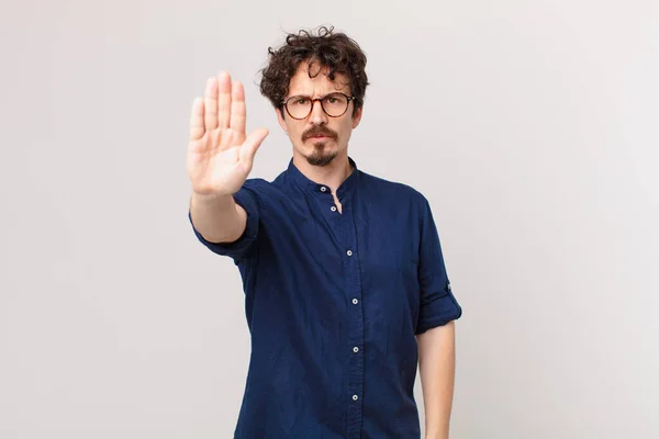 Young Handsome Man Looking Serious Showing Open Palm Making Stop — Stock Photo, Image