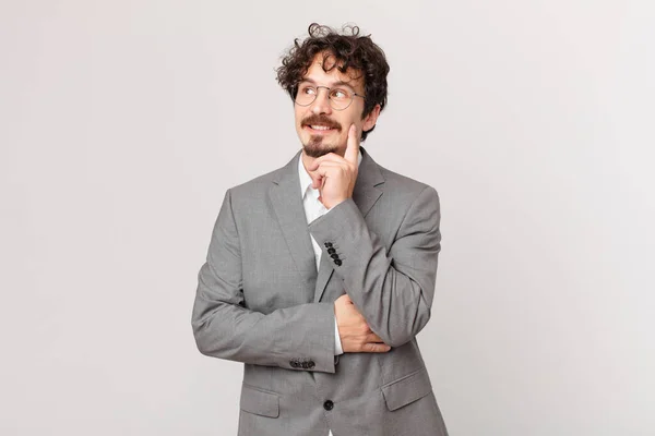 Young Businessman Smiling Happily Daydreaming Doubting — Foto de Stock