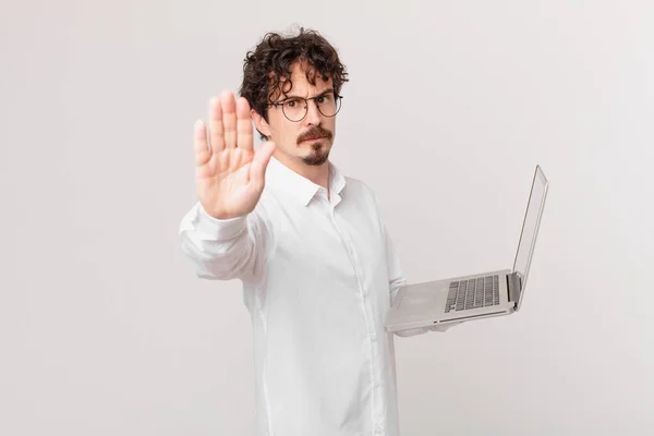 Young Man Laptop Looking Serious Showing Open Palm Making Stop — Stock Photo, Image