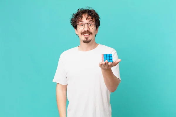 Young Man Solving Intelligence Problem Looking Happy Pleasantly Surprised — Foto de Stock