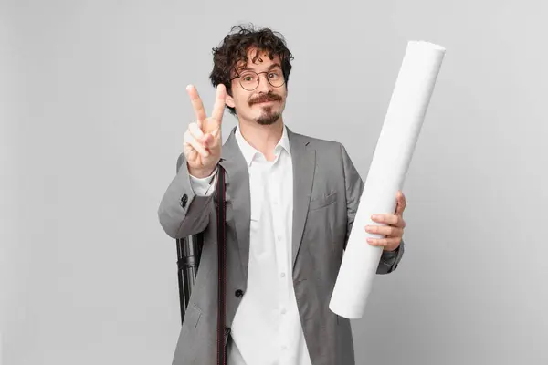 Young Architect Smiling Looking Friendly Showing Number Two — Stock Photo, Image