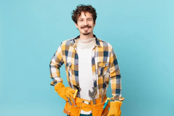 Young Handyman Housekeeper Smiling Happily Hand Hip Confident — Foto de Stock