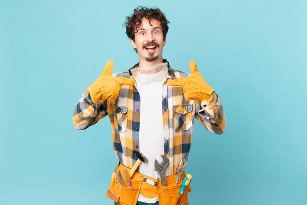 Young Handyman Housekeeper Feeling Happy Pointing Self Excited — Stockfoto