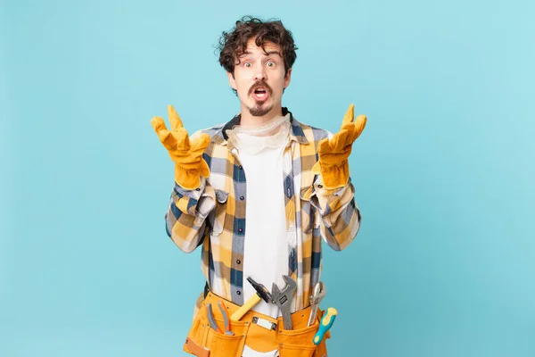 Young Handyman Housekeeper Feeling Extremely Shocked Surprised — Foto de Stock