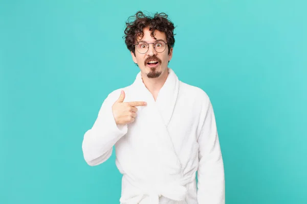 Young Man Wearing Bathrobe Looking Shocked Surprised Mouth Wide Open — Stock Photo, Image