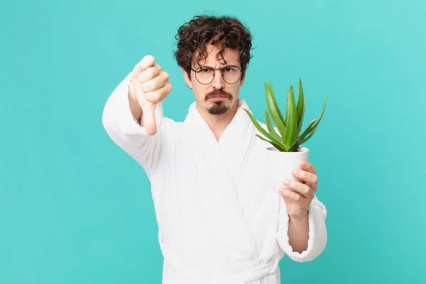 Young Man Wearing Bathrobe Feeling Cross Showing Thumbs — Stock Photo, Image