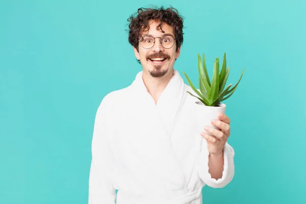 Jonge Man Draagt Badjas Kijken Gelukkig Aangenaam Verrast — Stockfoto