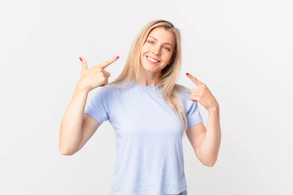 Young Blonde Woman Smiling Confidently Pointing Own Broad Smile — Stock Photo, Image