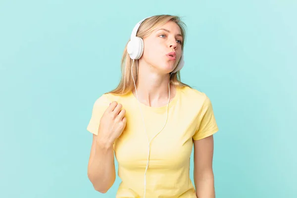 Young Blonde Woman Feeling Stressed Anxious Tired Frustrated Listening Music — Stockfoto