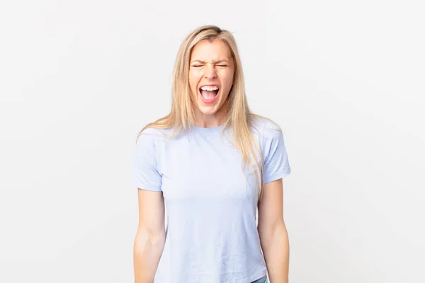 Young Blonde Woman Shouting Aggressively Looking Very Angry — Stock Photo, Image