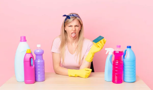Young Blonde Woman Feeling Disgusted Irritated Tongue Out Housekeeper Concept — Stock Photo, Image