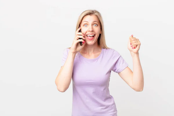 Young Blonde Woman Feeling Shocked Laughing Celebrating Success Calling Smart — Stock Photo, Image
