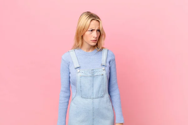 Young Blonde Woman Feeling Sad Upset Angry Looking Side — Stock Photo, Image