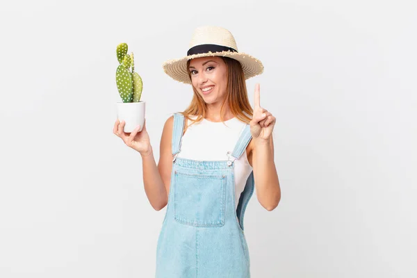 Pretty Woman Smiling Proudly Confidently Making Number One Holding Cactus — Stock Photo, Image