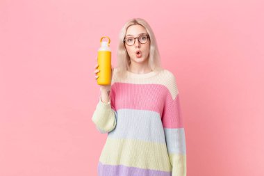blond pretty woman with a smoothy