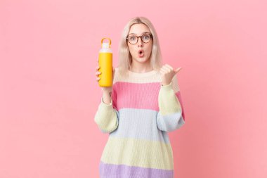 blond pretty woman with a smoothy