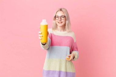 blond pretty woman with a smoothy