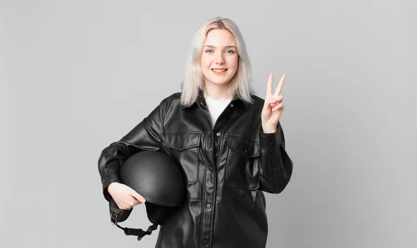 Blond Pretty Woman Smiling Looking Friendly Showing Number Two Motorbike — Stock Fotó