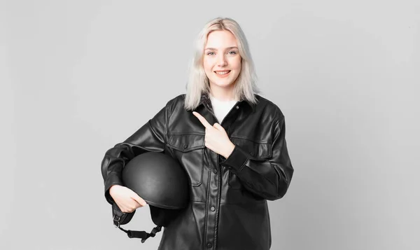 Blond Pretty Woman Smiling Cheerfully Feeling Happy Pointing Side Motorbike — Stock Fotó