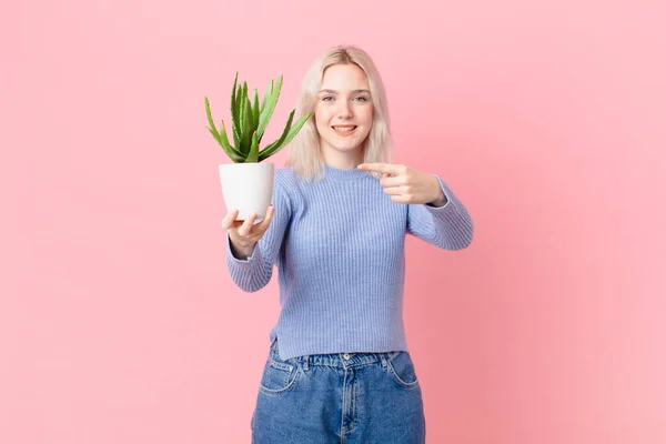 Blond Woman Holding Cactus — ストック写真