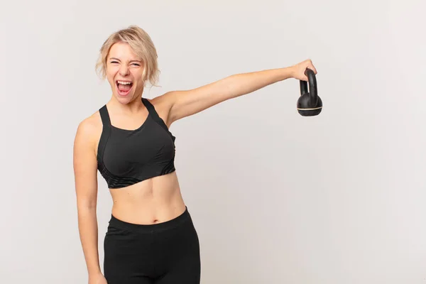 Blond Pretty Woman Lifting Dumbbell — Stock Photo, Image