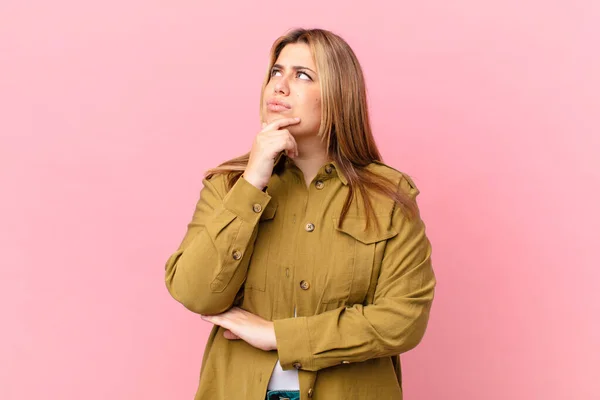 Curvy pretty blonde woman thinking, feeling doubtful and confused — Stock Image Curvy Pretty Blonde Woman Thinking Feeling Doubtful Confused Stock Image