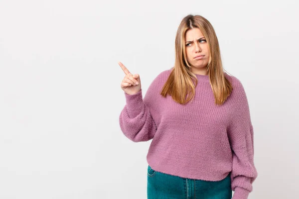 Curvy pretty blonde woman feeling sad, upset or angry and looking to the side — Stock Image Curvy Pretty Blonde Woman Feeling Sad Upset Angry Looking Side Stock Photo