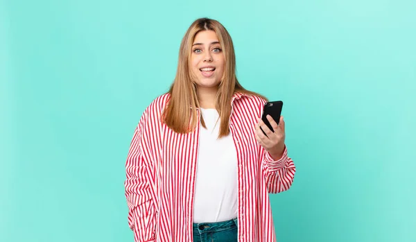 Curvy Pretty Blonde Woman Looking Happy Pleasantly Surprised Holding Smart — Stock Photo, Image