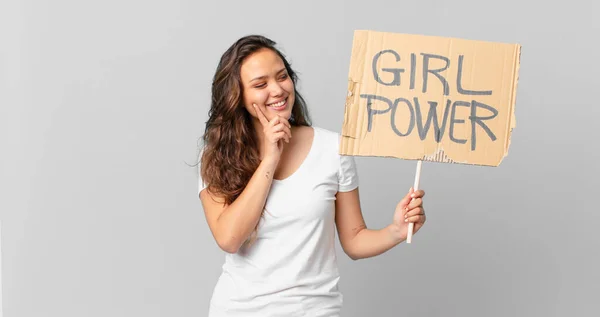 Young Pretty Woman Smiling Happily Daydreaming Doubting Holding Girl Power — Stock Photo, Image