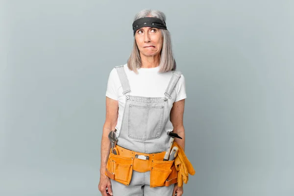 Middle Age White Hair Woman Looking Puzzled Confused Wearing Work — Stock Photo, Image